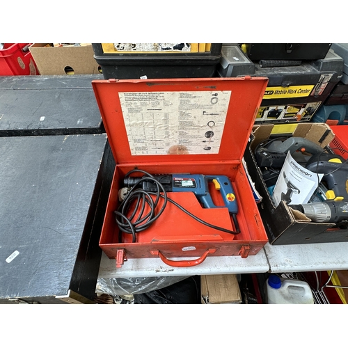1068 - A collection of empty tool boxes and tools to include Bosch UBH 2/20 SE-RL SDS drill, Black & Decker... 