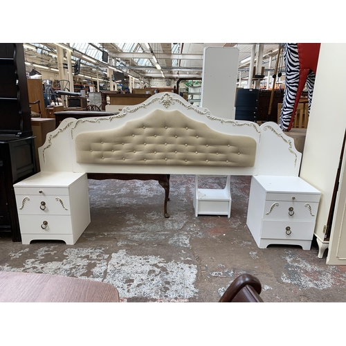 122 - A French style white painted and gilded bed headboard and two matching bedside cabinets - approx. 12... 