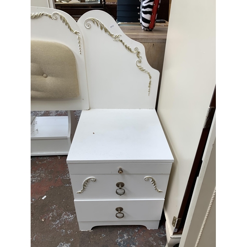 122 - A French style white painted and gilded bed headboard and two matching bedside cabinets - approx. 12... 