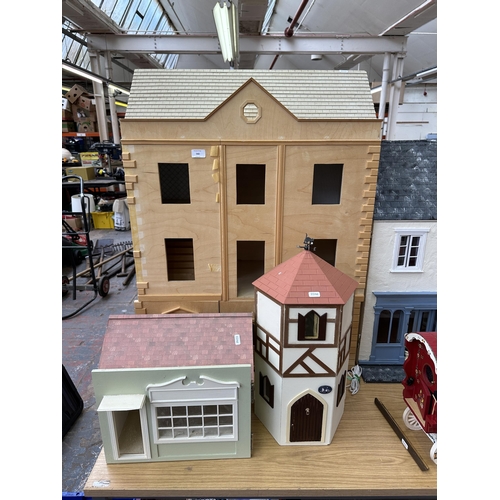 542 - Three handmade and painted doll's houses - largest approx. 95cm high x 71cm wide x 38cm deep