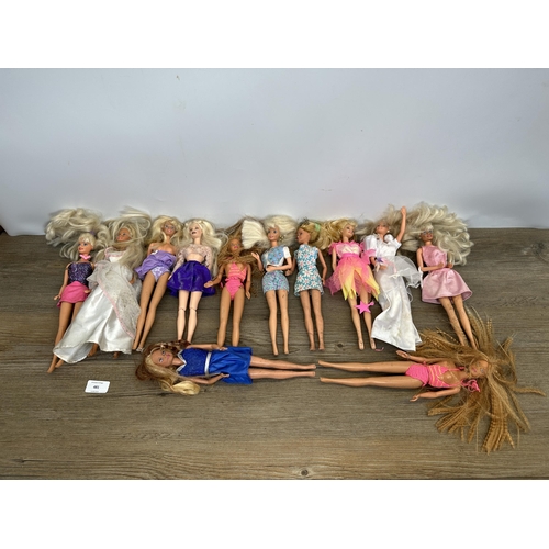 481 - A collection of vintage Mattel Barbie figurines