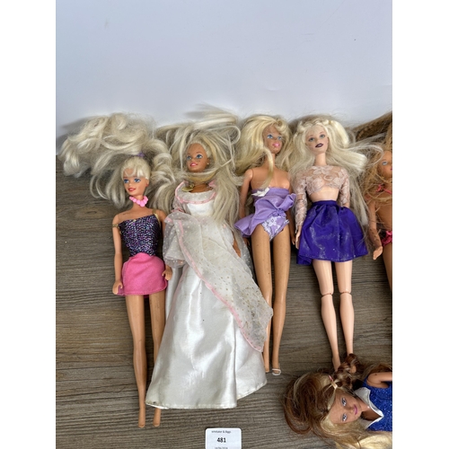 481 - A collection of vintage Mattel Barbie figurines