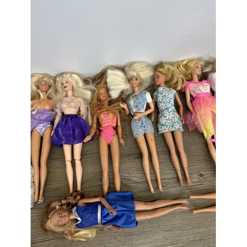 481 - A collection of vintage Mattel Barbie figurines