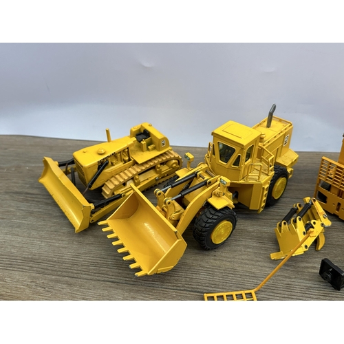 496 - Five diecast model construction vehicles, NZG No.167, Gescha Caterpillar D9, NZG 621, Gescha Caterpi... 