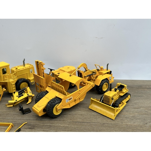 496 - Five diecast model construction vehicles, NZG No.167, Gescha Caterpillar D9, NZG 621, Gescha Caterpi... 