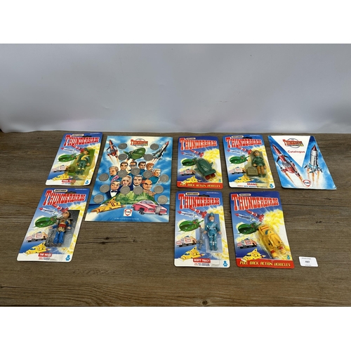 497 - Seven pieces of Thunderbirds Collectables comprising one Fina 1993 promotion complete coin collectio... 