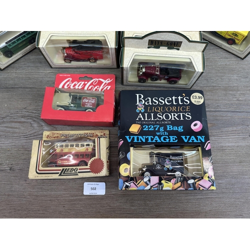 502 - A collection of boxed diecast model vehicles to include Bassett's Liquorice Allsorts delivery van, C... 