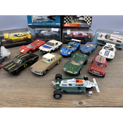 508 - A collection of Scalextric accessories to include boxed Ferrari 312 T3, C134 ELF Renault RS-01, boxe... 