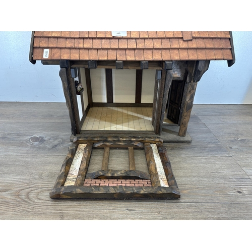 539 - A 2013 Roy Williams handmade Tudor style doll's house - approx. 47cm high x 51cm wide x 32cm deep