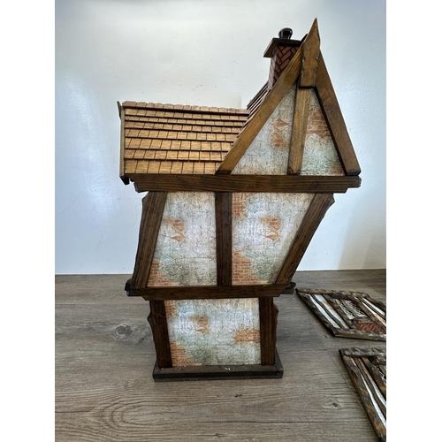 540 - A 2012 Roy Williams handmade Tudor style two storey doll's house - approx. 71cm high x 45cm wide x 3... 