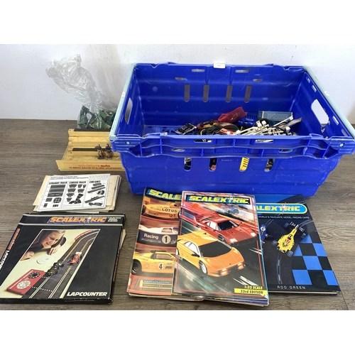 510 - A collection of Scalextric accessories to include trackside stand, slot cars, magazines, Matchless p... 