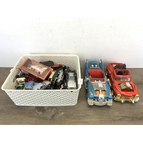 515 - A collection of diecast model vehicles to include Bburago, Matchbox, Maisto etc. together with two M... 