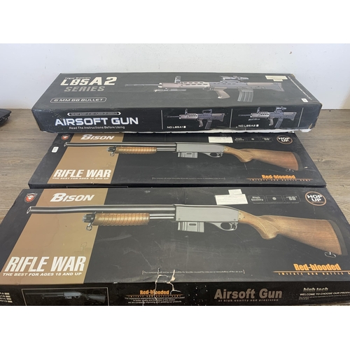 525 - Six Airsoft BB guns comprising two pump action shotguns, three boxed Bison Red-Blooded rifles and on... 