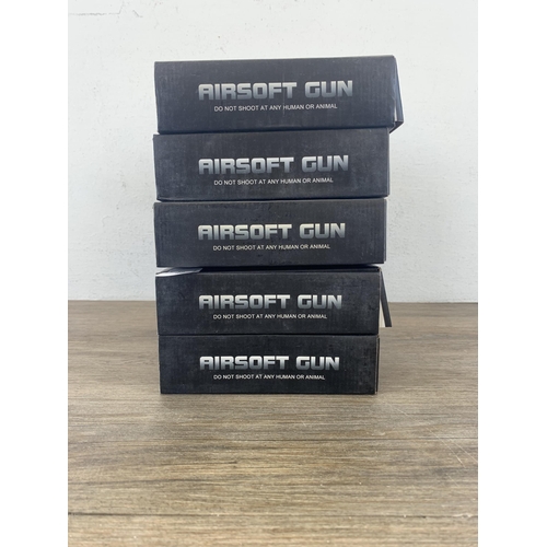 532 - Five boxed G.126 mm Airsoft guns together with a container of approx. 2000 Small Dragon Bead 6mm BB ... 