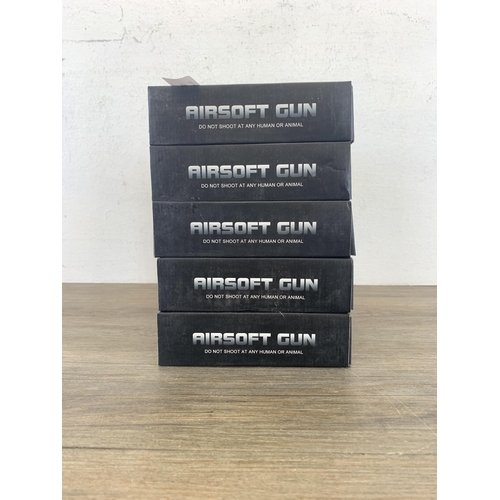 533 - Five boxed G.126 mm Airsoft guns together with a container of approx. 2000 Small Dragon Bead 6mm BB ... 