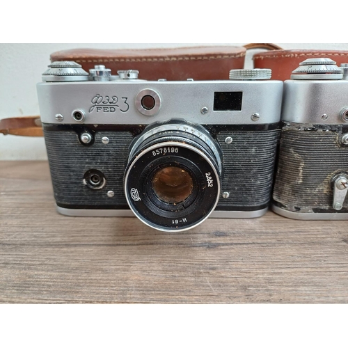 708 - Six Eastern European 35mm cameras, three cased FED screwmount rangefinder, FED 3b  fitted with Indus... 