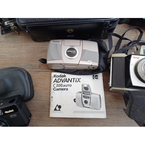 709 - Six items to include cased Hanimex 10x50 binoculars, Pentax PC35AF-M compact 35mm autofocus camera, ... 