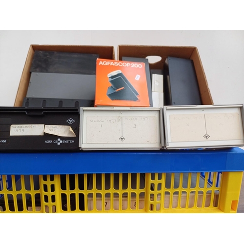 711 - Three boxes containing a large quantity of slides and a boxed Agfascop 200 slide viewer