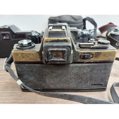 713 - Four 35mm SLR cameras, one Pentax ME Super fitted with Pentax-M 1:1.7 50mm lens, one Ricoh XR-X fitt... 