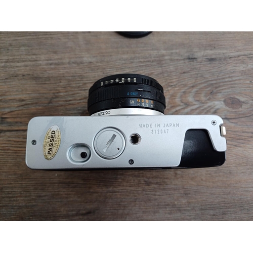 718 - A cased Olympus 35 RD 35mm fully manual mechanical shutter fixed-lens 35mm rangefinder camera fitted... 