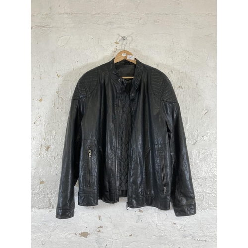 553 - An F & F black leatherette jacket - size 2XL