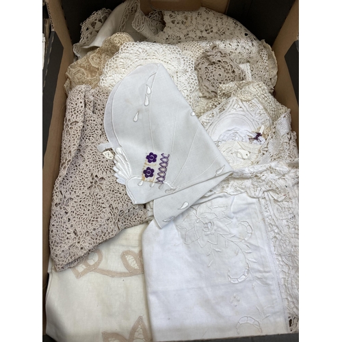 560 - Two boxes containing a collection of vintage embroidered and lace linen