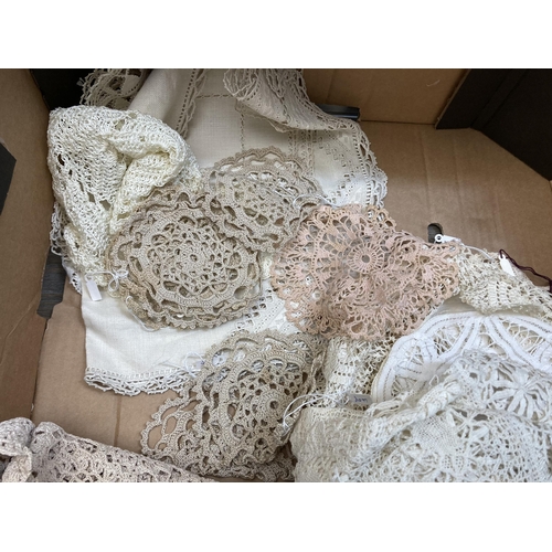 560 - Two boxes containing a collection of vintage embroidered and lace linen