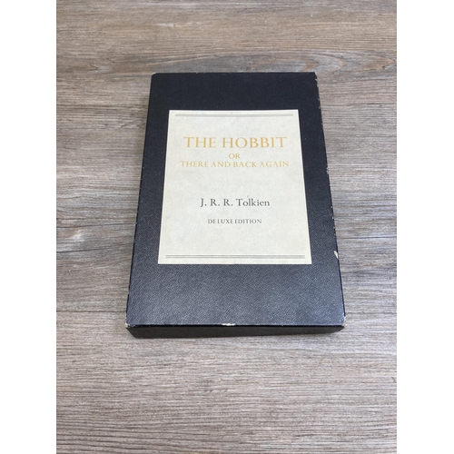 566 - A boxed 1979 The Hobbit Or There and Back Again De Luxe Edition hardback book with India paper and s... 