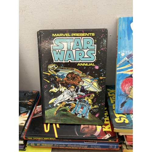 588 - A collection of vintage annuals to include Marvel Presents Star Wars, Star Trek, Night Rider, The Sm... 