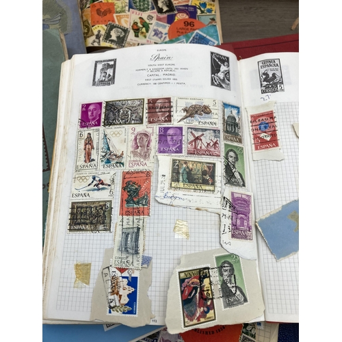 589 - A large collection of stamp albums containing a quantity of worldwide stamps