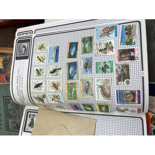 589 - A large collection of stamp albums containing a quantity of worldwide stamps