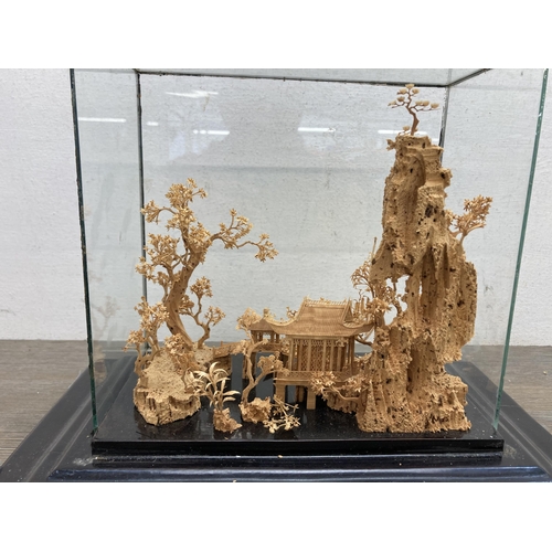 592 - An early to mid 20th century Chinese cork diorama in display case - approx. 24cm high x 29cm wide x ... 