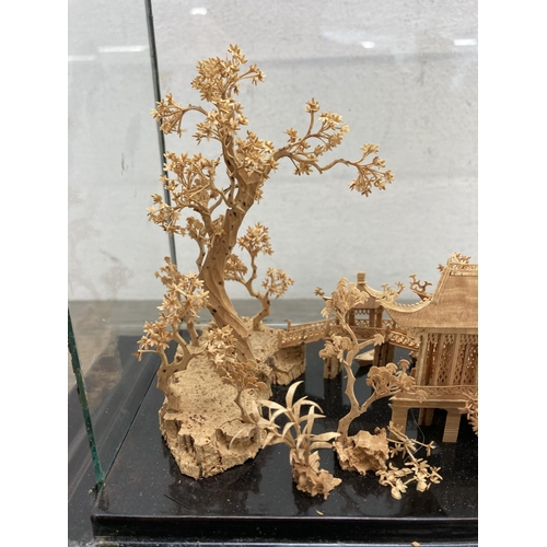 592 - An early to mid 20th century Chinese cork diorama in display case - approx. 24cm high x 29cm wide x ... 