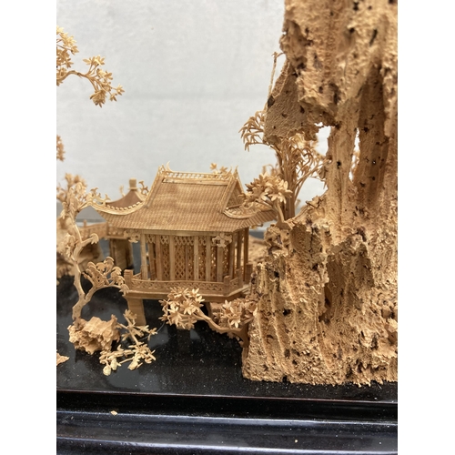 592 - An early to mid 20th century Chinese cork diorama in display case - approx. 24cm high x 29cm wide x ... 