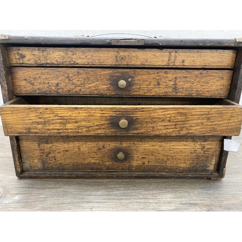 593 - An early/mid 20th century four drawer tool chest - approx. 26cm high x 41cm wide x 19cm deep