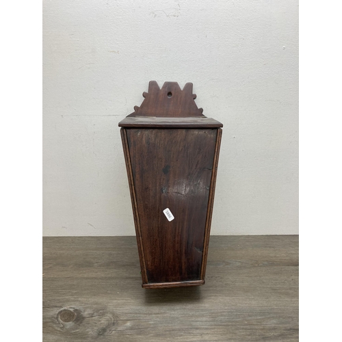 596 - A Georgian mahogany candle box - approx. 47cm high x 22cm wide