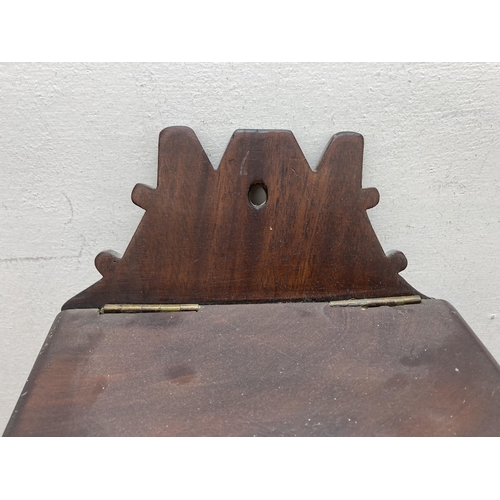 596 - A Georgian mahogany candle box - approx. 47cm high x 22cm wide