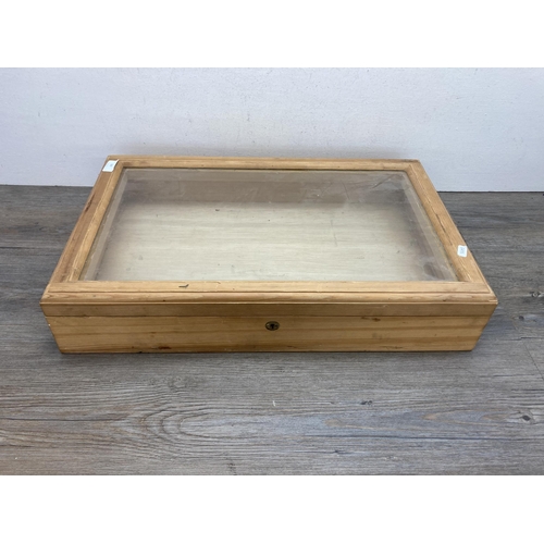 597 - A Victorian style pine and glazed table top display cabinet - approx. 12cm high x 61cm wide x 38cm d... 