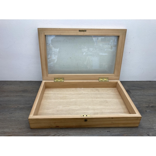 597 - A Victorian style pine and glazed table top display cabinet - approx. 12cm high x 61cm wide x 38cm d... 