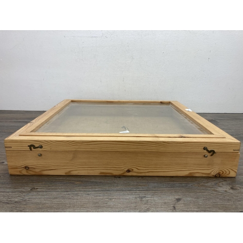 598 - A handmade pine and glazed table top display cabinet - approx. 8.5cm high x 51cm wide x 51cm deep