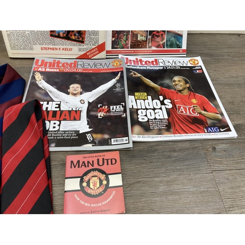 604 - A collection of Manchester United ephemera to include three embroidered ties, back page united hardb... 