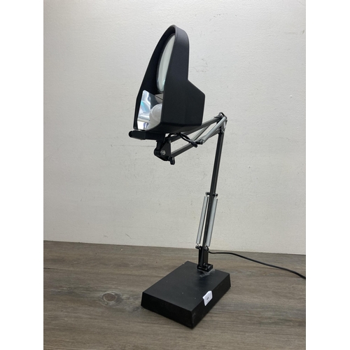 606 - A contemporary black metal angled magnifying desk lamp