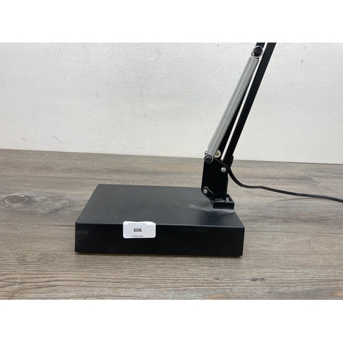 606 - A contemporary black metal angled magnifying desk lamp