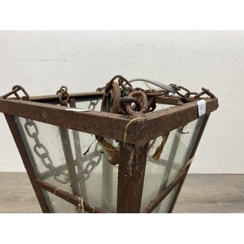 610 - A Georgian style cast iron and glazed porch lantern - approx. 28cm high x 26cm wide