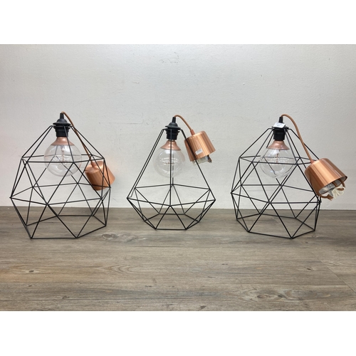 612 - Three contemporary IKEA Hemma black metal and copper cage style pendant lights