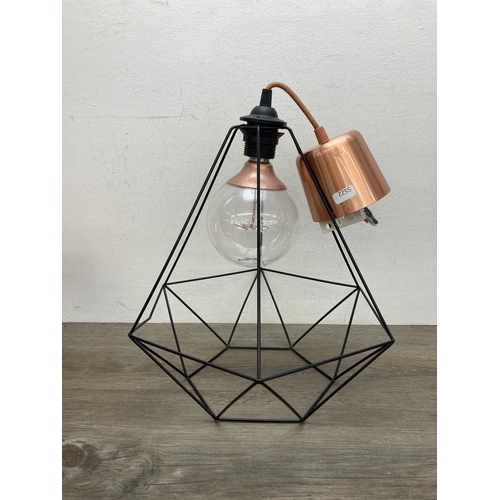 612 - Three contemporary IKEA Hemma black metal and copper cage style pendant lights