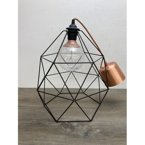 612 - Three contemporary IKEA Hemma black metal and copper cage style pendant lights