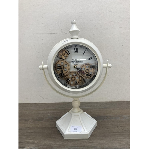 626 - A contemporary Champs Elysees of France skeleton quartz mantel clock - approx. 41cm high