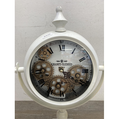 626 - A contemporary Champs Elysees of France skeleton quartz mantel clock - approx. 41cm high