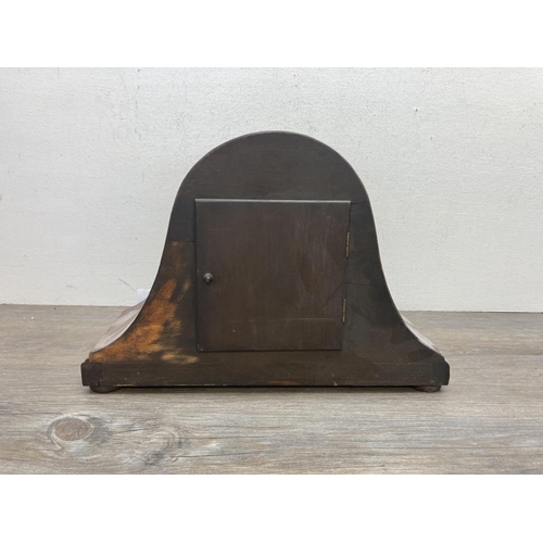 628 - A 1940s oak cased Napoleon Hat chiming mantel clock